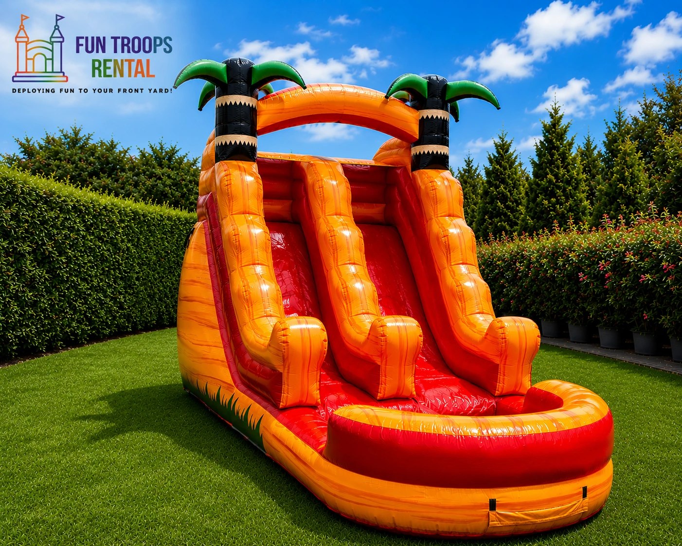 Tropical orange and red double-lane water slide with palm-tree towers and splash pool